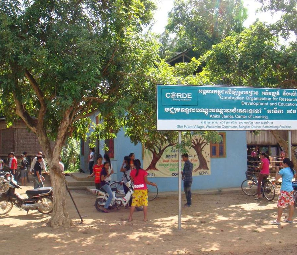 CORDE Anika James Center of Learning building and community members in Battambang, Cambodia